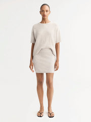 “Boucle” smėlio spalvos mini sijonas